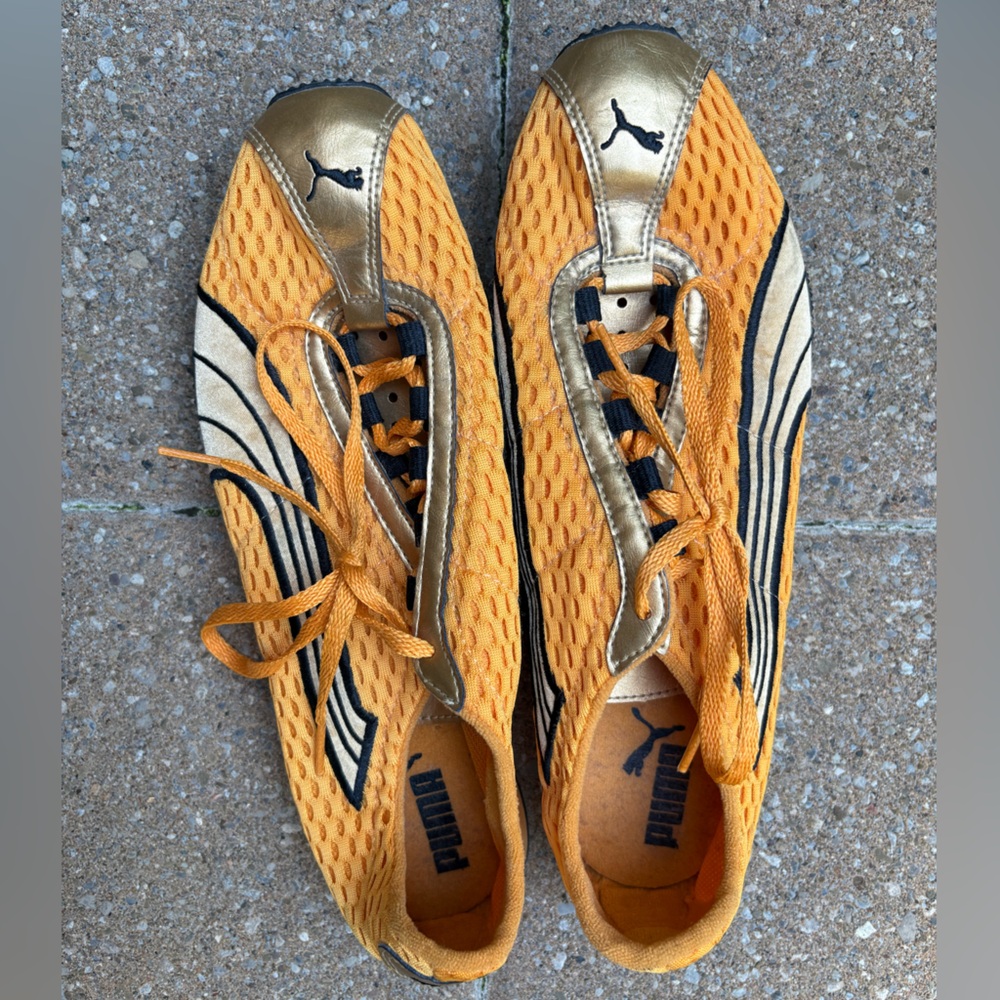 Puma Vibrant Orange and Gold Sneakers